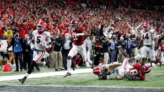 Georgia CB Kelee Ringo (5) puts an exclamation point on Georgia's 33-18 win over Alabama in the 2022 College Football Playoff National Championship Game with a game-sealing pick-six. Photo- Tony